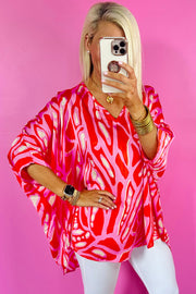 Bella Love Boutique California LLC Tops/Blouses & Shirts Red Abstract Print V Neck Batwing Sleeve Oversized Blouse