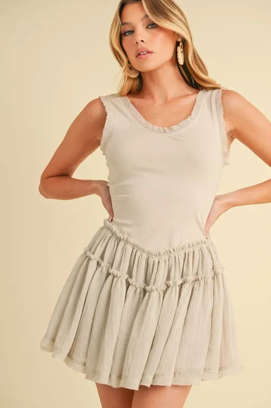 Trendsi Aemi+Co Frill Sleeveless Drop Waist Mini Dress